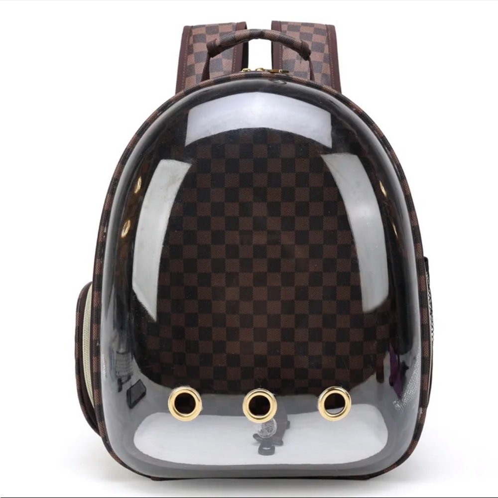 Luxury design checker pet carrier bubble backpack pet. Never used.